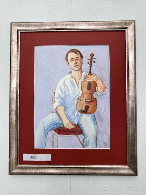 Portrait of a young man holding a Violin